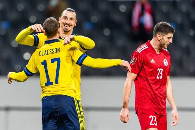210325 Viktor Claesson and Zlatan Ibrahimovic of Sweden celebrate after 1-0 during the FIFA World Cup, WM, Weltmeisterschaft, Fussball Qualifier football match between Sweden and Georgia on March 25, 2021 in Stockholm. Photo: Jesper Zerman BILDBYRAN COP 234 JM0097 bbeng fotboll football soccer fotball vm-kval kval fifa world cup qualifier qualifier landskamp sverige sweden sverige a georgia georgien jubel Copyright: JESPERxZERMAN BB210325JZ035