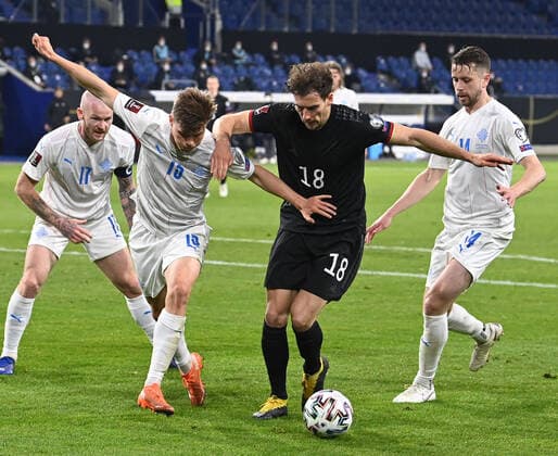 Fussball, Herren, Saison 2020 21, WM-Qualifikation (Gruppe J, 1. Spieltag) in Duisburg, Deutschland - Island, v. l. Aron Gunnarsson (Island), Alfons Sampsted (Island), Leon Goretzka (Deutschland), Kari Arnason (Island), 25.03. 2021, Copyright: xMatthiasxKochx