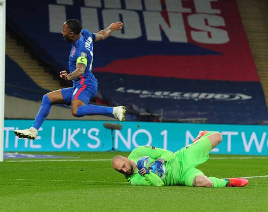 Football - 2022 FIFA World Cup, WM, Weltmeisterschaft, Fussball - European Qualifying - Group I - England vs San Marino - Wembley Stadium Raheem Sterling of England is fried by goalkeeper, goalkElia Beneedettini 