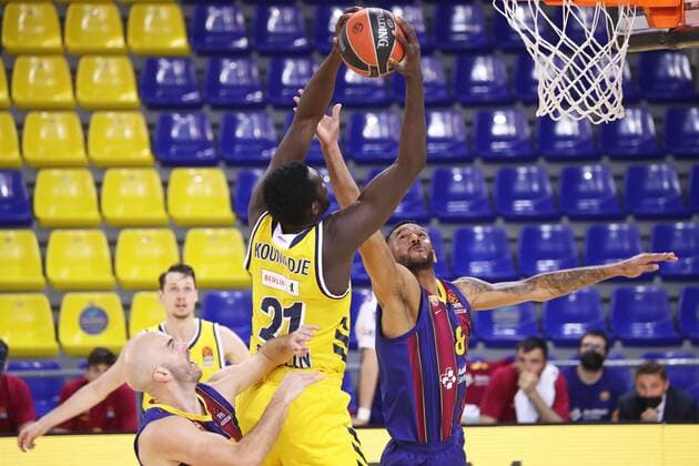 March 26, 2021, Barcelona, Catalonia, Spain: Christ Koumadje and Adam Hanga during the match betweeen FC Barcelona, Barca and Alba Berlin, corresponding to the week 31 of the Euroleague, played at the Palau Blaugrana. Photo: JGS Cordon Press Cordon Press
