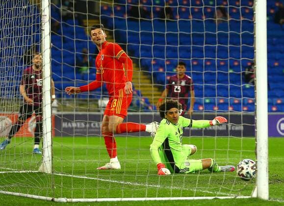 Mandatory Credit: Photo by Kieran McManus BPI Shutterstock (11832375i) Kieffer Moore of Wales scores a goal to make the score 1-0 Wales v Mexico, International Friendly, Länderspiel, Nationalmannschaft Football, The Cardiff City Stadium, Cardiff, UK - 27 Mar 2021 EDITORIAL USE ONLY No use with unauthorised audio, video, data, fixture lists, club league logos or live services. Online in-match use limited to 120 images, no video emulation. No use in betting, games or single club league player publications. Wales v Mexico, International Friendly, Football, The Cardiff City Stadium, Cardiff, UK - 27 Mar 2021 EDITORIAL USE ONLY No use with unauthorised audio, video, data, fixture lists, club league logos or live services. Online in-match use limited to 120 images, no video emulation. No use in betting, games or single club league player publications. Copyright: xKieranxMcManus BPI Shutterstockx 11832375i