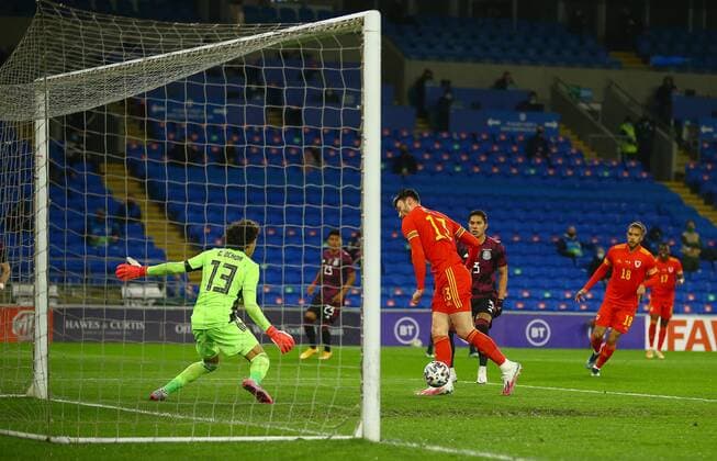Mandatory Credit: Photo by Kieran McManus BPI Shutterstock (11832375j) Kieffer Moore of Wales scores a goal to make the score 1-0 Wales v Mexico, International Friendly, Länderspiel, Nationalmannschaft Football, The Cardiff City Stadium, Cardiff, UK - 27 Mar 2021 EDITORIAL USE ONLY No use with unauthorised audio, video, data, fixture lists, club league logos or live services. Online in-match use limited to 120 images, no video emulation. No use in betting, games or single club league player publications. Wales v Mexico, International Friendly, Football, The Cardiff City Stadium, Cardiff, UK - 27 Mar 2021 EDITORIAL USE ONLY No use with unauthorised audio, video, data, fixture lists, club league logos or live services. Online in-match use limited to 120 images, no video emulation. No use in betting, games or single club league player publications. Copyright: xKieranxMcManus BPI Shutterstockx 11832375j