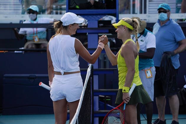 MIAMI GARDENS, FL - MARCH 27: Victoria Azarenka (BLR) left, wins her match against Angelique Kerber (GER) during the third round match of the Miami Open on March 27, 2021, at Hard Rock Stadium in Miami Gardens, Florida. (Photo by Michele Eve Sandberg Icon Sportswire) TENNIS: MAR 27 Miami Open Icon2103270541