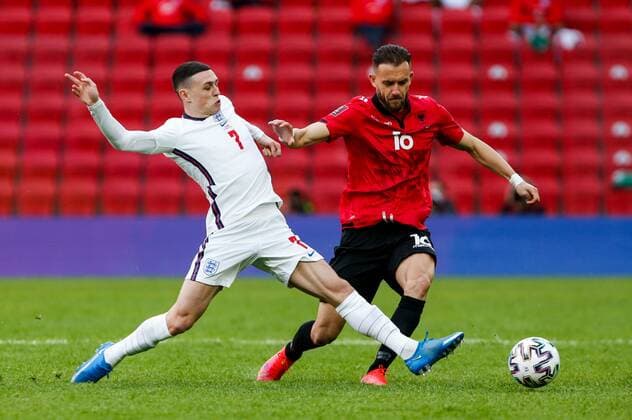 Mandatory Credit: Photo by Nikola Krstic BPI Shutterstock (11832717u) Phil Foden of England and Sokol Cikalleshi of Albania Albania v England, FIFA World Cup, WM, Weltmeisterschaft, Fussball Qualifying Group I, Football, Arena Kombetare, Tirana, Albania - 28 Mar 2021 Albania v England, FIFA World Cup Qualifying Group I, Football, Arena Kombetare, Tirana, Albania - 28 Mar 2021 Copyright: xNikolaxKrstic BPI Shutterstockx 11832717u