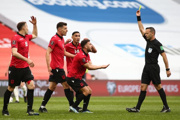 Albania v England 2022 FIFA World Cup, WM, Weltmeisterschaft, Fussball Qualifiers Keidi Bare of Albania is booked by match referee Orel Grinfeld during the 2022 FIFA World Cup Qualifiers match at the Air Albania Stadium, Tirana Content Not Available For UK Newspapers Copyright: xFocusxImagesx FIL-15360-0023