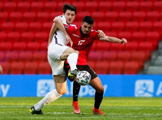 Mandatory Credit: Photo by Nikola Krstic BPI Shutterstock (11832717co) Harry Maguire of England and Armando Broja of Albania Albania v England, FIFA World Cup, WM, Weltmeisterschaft, Fussball Qualifying Group I, Football, Arena Kombetare, Tirana, Albania - 28 Mar 2021 Albania v England, FIFA World Cup Qualifying Group I, Football, Arena Kombetare, Tirana, Albania - 28 Mar 2021 Copyright: xNikolaxKrstic BPI Shutterstockx 11832717co