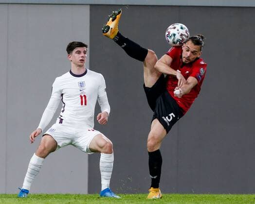 Mandatory Credit: Photo by Nikola Krstic BPI Shutterstock (11832717eb) Freddie Veseli of Albania with Mason Mount of England Albania v England, FIFA World Cup, WM, Weltmeisterschaft, Fussball Qualifying Group I, Football, Arena Kombetare, Tirana, Albania - 28 Mar 2021 Albania v England, FIFA World Cup Qualifying Group I, Football, Arena Kombetare, Tirana, Albania - 28 Mar 2021 Copyright: xNikolaxKrstic BPI Shutterstockx 11832717eb