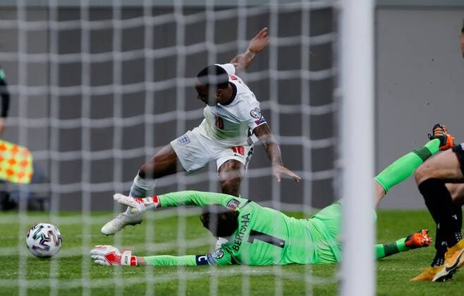 Mandatory Credit: Photo by Nikola Krstic BPI Shutterstock (11832717ef) Raheem Sterling of England and Etrit Berisha goalkeeper of Albania Albania v England, FIFA World Cup, WM, Weltmeisterschaft, Fussball Qualifying Group I, Football, Arena Kombetare, Tirana, Albania - 28 Mar 2021 Albania v England, FIFA World Cup Qualifying Group I, Football, Arena Kombetare, Tirana, Albania - 28 Mar 2021 Copyright: xNikolaxKrstic BPI Shutterstockx 11832717ef