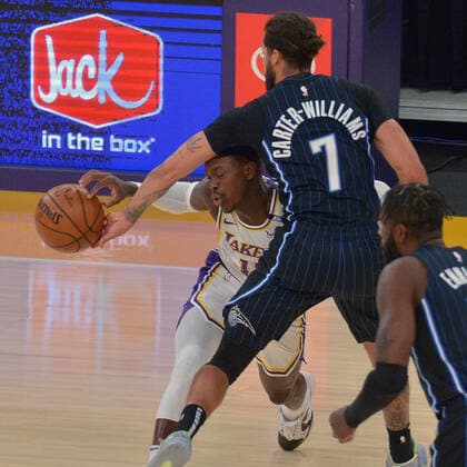 Basketball, NBA, Los Angeles Lakers - Orlando Magic Orlando Magic guard Michael Carter-Williams steals the ball from Los Angeles Lakers point guard Dennis Schroder during the first half at Staples Center in Los Angeles on Sunday, March 28, 2021. The Lakers defeated the Magic 96-93.  LAP2021032802 JIMxRUYMEN