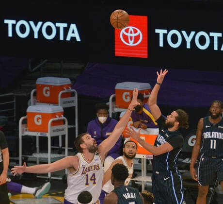 Basketball, NBA, Los Angeles Lakers - Orlando Magic Orlando Magic guard Michael Carter-Williams shoots over Los Angeles Lakers center Marc Gasol during the first half at Staples Center in Los Angeles on Sunday, March 28, 2021. The Lakers defeated the Magic 96-93.  LAP2021032805 JIMxRUYMEN