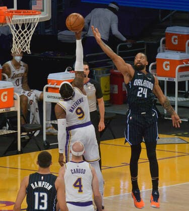 Basketball, NBA, Los Angeles Lakers - Orlando Magic Los Angeles Lakers guard Wesley Matthews blocks the shot of Orlando Magic center Khem Birch during the first half at Staples Center in Los Angeles on Sunday, March 28, 2021. The Lakers defeated the Magic 96-93.  LAP2021032806 JIMxRUYMEN