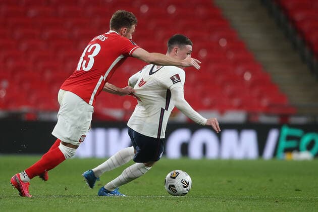 England v Poland 2022 FIFA World Cup, WM, Weltmeisterschaft, Fussball Qualifiers Phil Foden of England is fouled by Maciej Rebus of Poland during the 2022 FIFA World Cup Qualifiers match at Wembley Stadium, London Content Not Available For UK Newspapers Copyright: xPaulxChestertonx FIL-15363-0029
