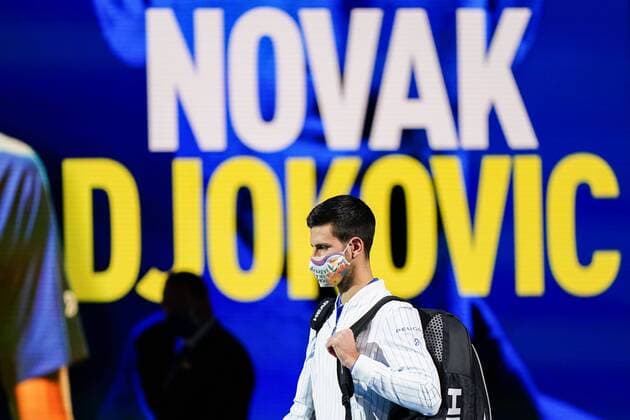 Mandatory Credit: Photo by Dave Shopland BPI Shutterstock (11013812f) Novak Djokovic of Serbia wears a mask as he walks out on to court for a group round match Nitto ATP, Tennis Herren Finals 2020, Day Two, Tennis, The 02 Arena, London, UK - 16 Nov 2020 EDITORIAL USE ONLY No use with unauthorised audio, video, data, fixture lists, club league logos or live services. Online in-match use limited to 120 images, no video emulation. No use in betting, games or single club league player publications. Nitto ATP Finals 2020, Day Two, Tennis, The 02 Arena, London, UK - 16 Nov 2020 EDITORIAL USE ONLY No use with unauthorised audio, video, data, fixture lists, club league logos or live services. Online in-match use limited to 120 images, no video emulation. No use in betting, games or single club league player publications. Copyright: xDavexShopland BPI Shutterstockx 11013812f