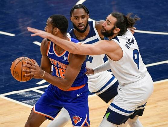 Minnesota Timberwolves Ricky Rubio and Jaylen Nowell (C) in action against New York Knicks Alec Burks (L) during an NBA, Basketball Herren, USA game at the Target Center in Minneapolis, Minnesota, USA, 31 March 2021. New York Knicks vs Minnesota Timberwolves !ACHTUNG: NUR REDAKTIONELLE NUTZUNG!  Copyright: xCRAIGxLASSIGx AME7249 20210401-637528498095058200