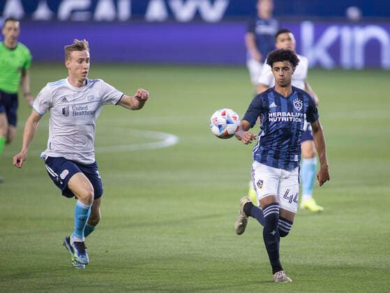 March 31, 2021, Carson, California, USA: Jalen Neal 44 of the L.A. Galaxy defends against Adam Buksa 9 of the New England Revolution during their preseason MLS, Fussball Herren, USA game on Wednesday March 31, 2021 at the Dignity Health Sports Park in Carson, California. LA Galaxy loses to Revolution, 4-1. PI Carson USA - ZUMAp124 20210331_zaa_p124_003 Copyright: xJAVIERxROJASx