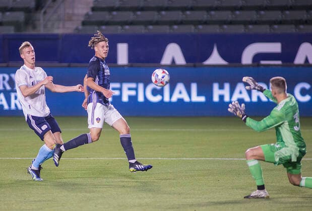 March 31, 2021, Carson, California, USA: Jonathan Klinsmann 33 of the L.A. Galaxy blocks a shot by Adam Buksa 9 of the New England Revolution during their preseason MLS, Fussball Herren, USA game on Wednesday March 31, 2021 at the Dignity Health Sports Park in Carson, California. LA Galaxy loses to Revolution, 4-1. PI Carson USA - ZUMAp124 20210331_zaa_p124_007 Copyright: xJAVIERxROJASx