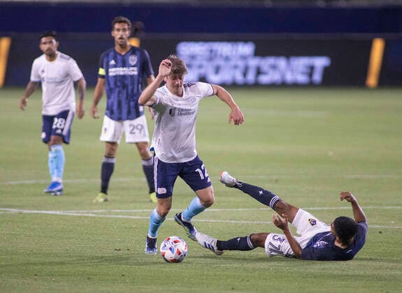 March 31, 2021, Carson, California, USA: Danilo Aguirre 37 of the L.A. Galaxy is unable to defend against Justin Rennicks 12 of the New England Revolution during their preseason MLS, Fussball Herren, USA game on Wednesday March 31, 2021 at the Dignity Health Sports Park in Carson, California. LA Galaxy loses to Revolution, 4-1. PI Carson USA - ZUMAp124 20210331_zaa_p124_009 Copyright: xJAVIERxROJASx