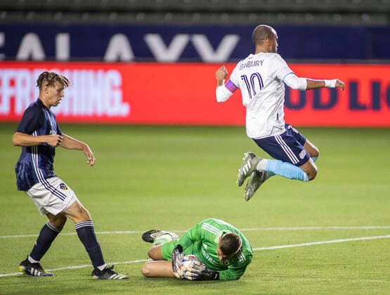 March 31, 2021, Carson, California, USA: Jonathan Klinsmann 33 of the L.A. Galaxy blocks a shot by Teal Bunbury 10 of the New England Revolution during their preseason MLS, Fussball Herren, USA game on Wednesday March 31, 2021 at the Dignity Health Sports Park in Carson, California. LA Galaxy loses to Revolution, 4-1. PI Carson USA - ZUMAp124 20210331_zaa_p124_017 Copyright: xJAVIERxROJASx