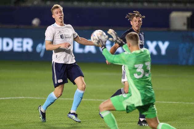 March 31, 2021: New England Revolution forward Adam Buksa (9) canÃ¢â‚¬â ¢t get his shot past Los Angeles Galaxy goalkeeper Jonathan Klinsmann (33) during the game between the New England Revolution and the Los Angeles Galaxy at Dignity Health Sports Park in Los Angeles, CA., USA. ( ) Carson USA - ZUMAc04_ 20210331_zaf_c04_438 Copyright: xPeterxJoneleitx