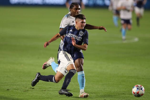 March 31, 2021: Los Angeles Galaxy forward Jonathan Perez (56) attacks with the ball during the game between the New England Revolution and the Los Angeles Galaxy at Dignity Health Sports Park in Los Angeles, CA., USA. ( ) Carson USA - ZUMAc04_ 20210331_zaf_c04_451 Copyright: xPeterxJoneleitx