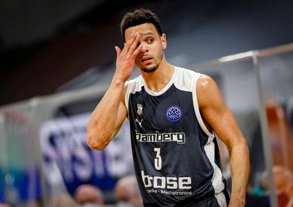 Dominic Lockhart (Brose Bamberg, 03) Basketball Champions League 2020 21, Playoof Spieltag 5, Brose Bamberg - Dinamo Sassari 01.04.2021, Bamberg, Brose Arena - Copyright: DanielxLöb