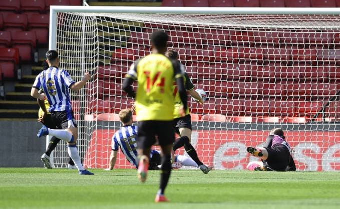 Watford score through an own goal by Tom Lees of Sheffield Wednesday during the Sky Bet Championship match at Vicarage Road, Watford. Picture date: 2nd April 2021. Picture credit should read: David Klein Sportimage EDITORIAL USE ONLY. No use with unauthorised audio, video, data, fixture lists, club league logos or live services. Online in-match use limited to 120 images, no video emulation. No use in betting, games or single club league player publications. SPI-0984-0004
