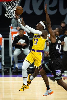 April 2, 2021, Sacramento, CA, USA: Los Angeles Lakers guard Dennis Schroder (17) drives to the basket past Sacramento Kings forward Harrison Barnes (40) in the first quarter during a game at Golden 1 Center on Friday, April 2, 2021 in Sacramento. Sacramento USA - ZUMAj89_ 20210402_zaf_j89_002 Copyright: xPaulxKitagakixJr.x
