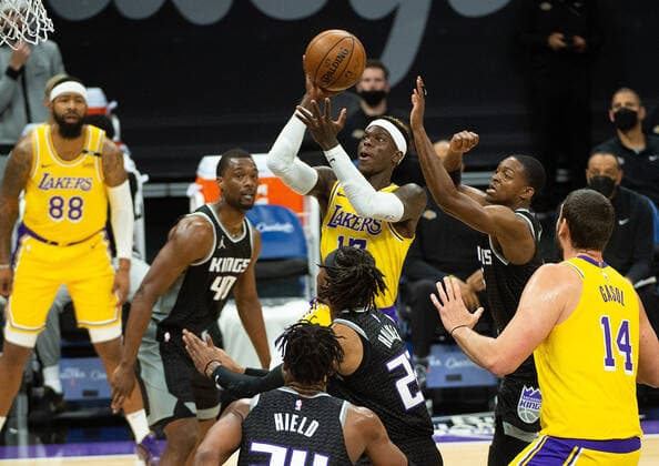 April 2, 2021, Sacramento, CA, USA: Los Angeles Lakers guard Dennis Schroder (17)shoots over Sacramento Kings forward Chimezie Metu (25) in the first quarter during a game at Golden 1 Center on Friday, April 2, 2021 in Sacramento. Sacramento USA - ZUMAj89_ 20210402_zaf_j89_003 Copyright: xPaulxKitagakixJr.x