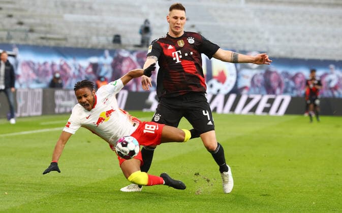 RB Leipzig - FC Bayern 03.04.2021 Leipzig, 03.04.2021, Red Bull Arena, Fussball, Bundesliga, 27.Spieltag , RB Leipzig vs. FC Bayern München , Im Bild v.l.: Christopher Nkunku (18, RB Leipzig), Niklas Süle Suele (4, Bayern). , DFL regulations prohibit any use of photographs as image sequences and or quasi-video. , *** RB Leipzig FC Bayern 03 04 2021 Leipzig, 03 04 2021, Red Bull Arena, Football, Bundesliga, 27 Spieltag , RB Leipzig vs FC Bayern Munich , Im Bild v l Christopher Nkunku 18, RB Leipzig , Niklas Süle Suele 4, Bayern , DFL regulations prohibit any use of photographs as image sequences and or quasi video ,