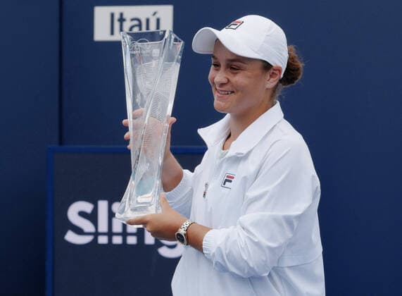 Ashleigh Barty from Australia holds the championship trophy after defeating Bianca Vanessa Andreescu from Canada in the women s finals at the Miami Open at Hard Rock Stadium in Miami Gardens, Florida on Saturday, April 3, 2021. Barty won 6-3, 4-0, Ret.  MIA20210403113 GARYxIxROTHSTEIN