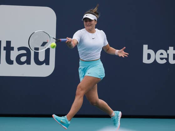 Bianca Vanessa Andreescu from Canada returns the ball to Ashleigh Barty from Australia in the second set Ashleigh Barty from Australia in the women s finals at the Miami Open at Hard Rock Stadium in Miami Gardens, Florida on Saturday, April 3, 2021. Barty won 6-3, 4-0, Ret.  MIA20210403136 GARYxIxROTHSTEIN