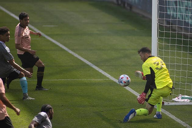 April 3, 2021, Los Angeles, California, USA: Matt Turner 30 of the New England Revolution saves a goal kick by Carlos Vela 10 of the LAFC during their preseason MLS, Fussball Herren, USA game on Saturday April 3, 2021 at the Banc of California stadium in Los Angeles, California. LAFC draws with N.E. Revolution 2-2. PI Los Angeles USA - ZUMAp124 20210403_zaa_p124_008 Copyright: xJAVIERxROJASx