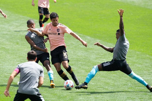 April 3, 2021, Los Angeles, California, USA: Carlos Vela 10 of the LAFC with the ball during their preseason MLS, Fussball Herren, USA game with the New England Revolution on Saturday April 3, 2021 at the Banc of California stadium in Los Angeles, California. LAFC draws with N.E. Revolution 2-2. PI Los Angeles USA - ZUMAp124 20210403_zaa_p124_034 Copyright: xDOUGLASxCUELLARx