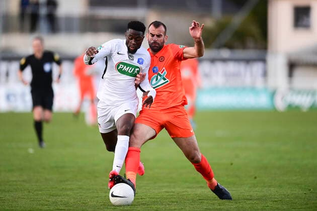 Petar Skuletic (MHSC) vs Dan Mukoko (Chateaubriant) FOOTBALL : Voltigeurs de Chateaubriant vs MHSC - 1 8 coupe de France - 07 04 2021 JBAutissier Panoramic 
