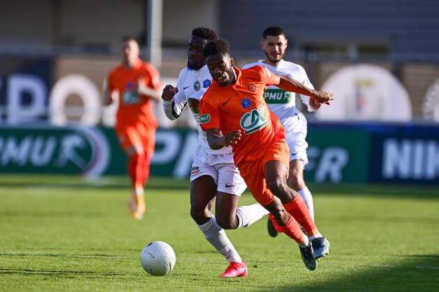 Sepe Elye Wahi (MHSC) vs Dan Mukoko (Chateaubriant) FOOTBALL : Voltigeurs de Chateaubriant vs MHSC - 1 8 coupe de France - 07 04 2021 JBAutissier Panoramic 