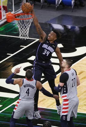 April 7, 2021, Orlando, Florida, USA: The Orlando Magic s Wendell Carter Jr. (34) dunks over the Washington Wizards Russell Westbrook (4) and Alex Len (15) at the Amway Center in Orlando, Florida, on Wednesday, April 7, 2021. Orlando USA - ZUMAm67_ 0116482263st Copyright: xStephenxM.xDowellx
