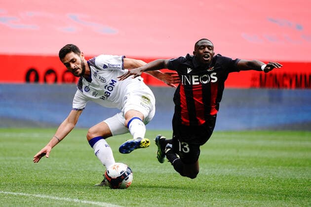 Hassane Kamara (OGC Nice) - Xavier Chavalerin (Stade de Reims) FOOTBALL : OGC Nice vs Stade de Reims - Ligue 1 Uber Eats - Nice - 11 04 2021 NorbertScanella PanoramiC 