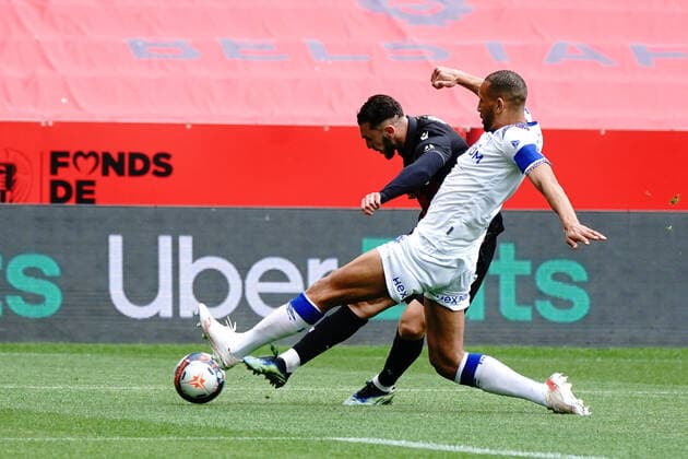 Amine Gouiri (OGC Nice) - Yunis Abdelhamid (Stade de Reims) FOOTBALL : OGC Nice vs Stade de Reims - Ligue 1 Uber Eats - Nice - 11 04 2021 NorbertScanella PanoramiC 