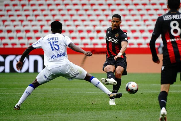 William Saliba (OGC Nice) - Marshall Munetsi (Stade de Reims) FOOTBALL : OGC Nice vs Stade de Reims - Ligue 1 Uber Eats - Nice - 11 04 2021 NorbertScanella PanoramiC 