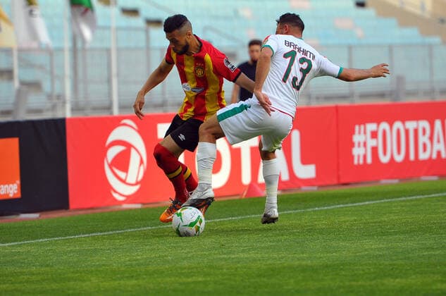 Anice Badri of EST in action with Belkacem Brahimi(13) of MCA during the Match Espérance Sportive de Tunis (EST) vs Mouloudia Club d Alger (MCA) counting for the CAF African Champions League at the Rades stadium.photo: Yassine Mahjoub CAF African Champions League: EST vs MC Algiers 