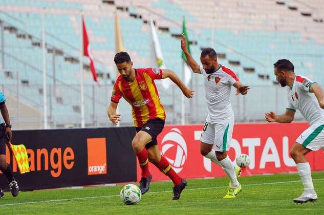 Nassim ben Khelifa(13) of EST in action with Taoufik Addadi(R) of MCA during the Match Espérance Sportive de Tunis (EST) vs Mouloudia Club d Alger (MCA) counting for the CAF African Champions League at the Rades stadium.photo: Yassine Mahjoub CAF African Champions League: EST vs MC Algiers 