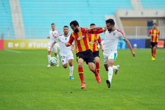 Yassine Khenissi of EST in action with Miloud Rebiai(R) of MCA during the Match Espérance Sportive de Tunis (EST) vs Mouloudia Club d Alger (MCA) counting for the CAF African Champions League at the Rades stadium.photo: Yassine Mahjoub CAF African Champions League: EST vs MC Algiers 