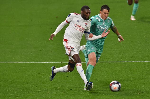 Karl Toko Ekambi (lyon) vs Pierrick Capelle (angers) FOOTBALL : Olympique Lyonnais vs SCO Angers - Ligue 1 Uber Eats - 11 04 2021 FredericChambert Panoramic 