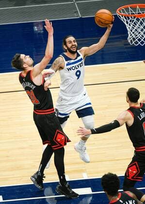 Minnesota Timberwolves guard Ricky Rubio (9) goes up for a shot past Chicago Bulls guard Tomas Satoransky, during the NBA, Basketball Herren, USA basketball game between the Chicago Bulls and the Minnesota Timberwolves at Target Center in Minneapolis, Minnesota, US, 11 April 2021. Chicago Bulls at Minnesota Timberwolves !ACHTUNG: NUR REDAKTIONELLE NUTZUNG!  Copyright: xCRAIGxLASSIGx AME9387 20210412-637537967163270281