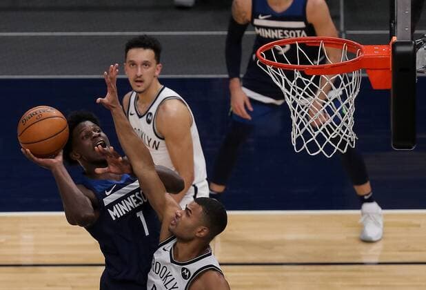 Anthony Edwards (L) of the Minnesota Timberwolves tries to score against Jeff Green of the Brooklyn Nets, during an NBA, Basketball Herren, USA game at the Target Center, in Minneapolis, United States, 13 april 2021. Minnesota Timbersolves vs Brooklyn Nets !ACHTUNG: NUR REDAKTIONELLE NUTZUNG!  Copyright: xBradxRempelx AME9753 20210414-637539600029618708