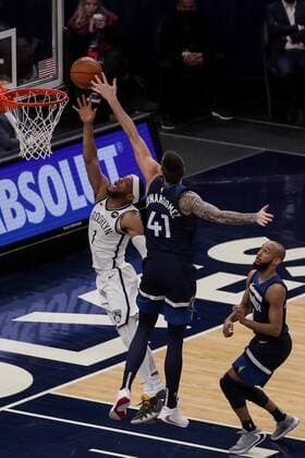 Spaniard Juancho Hernangomez (c) of the Minnesota Timberwolves tries a block against Bruce Brown (L) of the Brooklyn Nets, during an NBA, Basketball Herren, USA game at the Target Center, in Minneapolis, United States, 13 april 2021. Minnesota Timbersolves vs Brooklyn Nets !ACHTUNG: NUR REDAKTIONELLE NUTZUNG!  Copyright: xBradxRempelx AME9750 20210414-637539604902353280