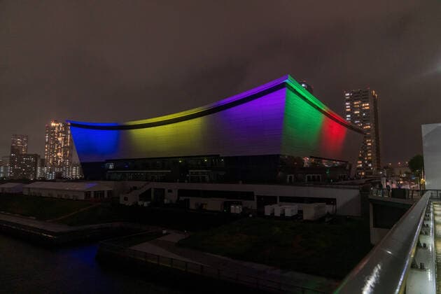 (210414) -- TOKYO, April 14, 2021 -- Ariake Arena is illuminated in Olympic colors to mark 100 days before the Tokyo 2020 Olympic Games, Olympische Spiele, Olympia, OS in Tokyo, Japan on April 14, 2021. (Photo by Xinhua) (SP)JAPAN-TOKYO-OLYMPIC-COUNT DOWN-ILLUMINATION ChristopherxJue 