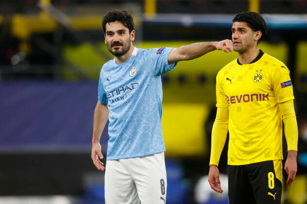 Bilder des Jahres 2021, Sport 04 April Sport Themen der Woche KW15 Dortmund, Deutschland, UEFA Champions League, Viertelfinale Borussia Dortmund - Manchester City FC 1-2 am 14. 04. 2021 im Signal-Iduna Park in Dortmund Ilka GÜNDOGAN (MCFC) li.- und Mahmoud DAHOUD (BVB) re.- Gemäß den Vorgaben der UEFA ist es untersagt, in dem Stadion und oder vom Spiel angefertigte Fotoaufnahmen in Form von Sequenzbildern und oder videoähnlichen Fotostrecken zu verwerten bzw. verwerten zu lassen. *** Dortmund, Germany, UEFA Champions League, quarter-final Borussia Dortmund Manchester City FC 1 2 on 14 04 2021 at Signal Iduna Park in Dortmund Ilka GÜNDOGAN MCFC left and Mahmoud DAHOUD BVB right In accordance with UEFA regulations, it is forbidden to use or have used photographs taken in the stadium or of the match in the form of sequence pictures or video-like photo series.