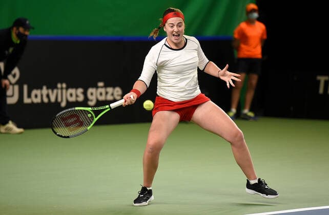 (210417) -- JURMALA, April 17, 2021 -- Jelena Ostapenko of Latvia competes against Ankita Raina of India during the Billie Jean King Cup by BNP Paribas play-offs between Latvia and India at the National Tennis Centre Lielupe in Jurmala, Latvia on April 16, 2021. (Photo by Xinhua) (SP)LATVIA-JURMALA-TENNIS-BILLIE JEAN KING CUP-PLAY-OFFS-LATVIA VS INDIA EdijsxPalens 