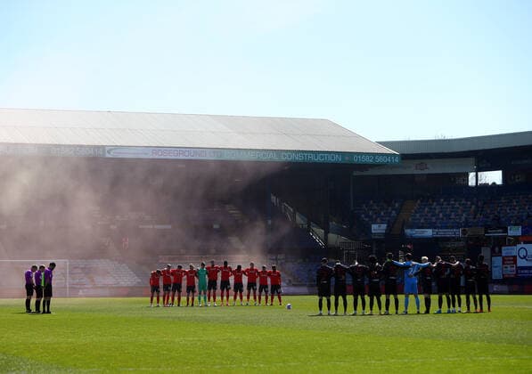 Luton Town v Watford Sky Bet Championship Officials, Luton Town and Watford players hold a minutes silence for the death of Prince Philip before the Sky Bet Championship match at Kenilworth Road, Luton Content Not Available For UK Newspapers Copyright: xMarkxChapmanx FIL-15448-0015